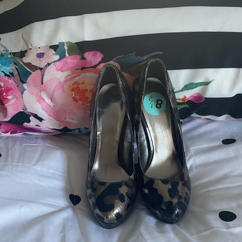 Cheetah high heels.  Worn once for a moment